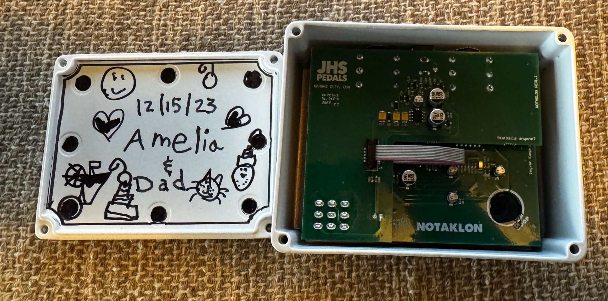 JHS Notaklön backplate hand-signed Amelia and Dad, 12/15/23, with drawings