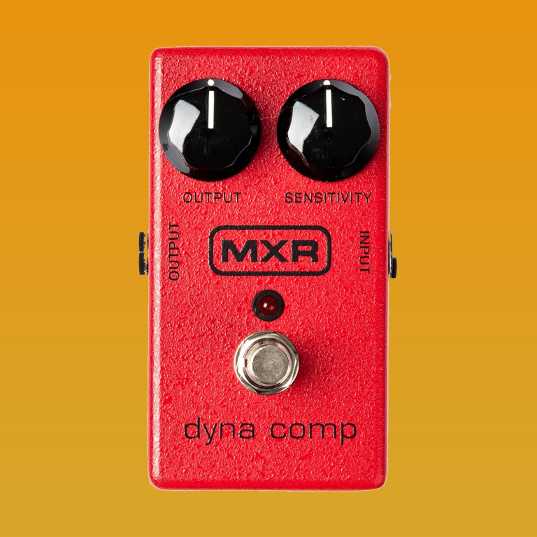 MXR Dyna Comp compressor pedal on a warm orange background
